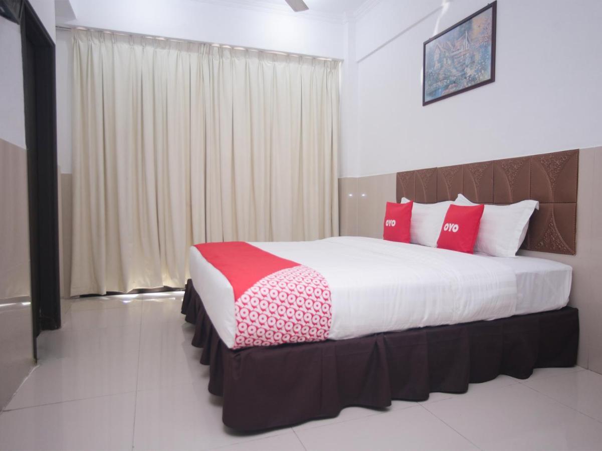 Oyo 89851 Leila Hotel Sandakan Bagian luar foto
